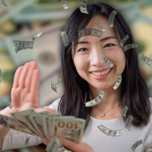 a woman covered in money is making a gesture