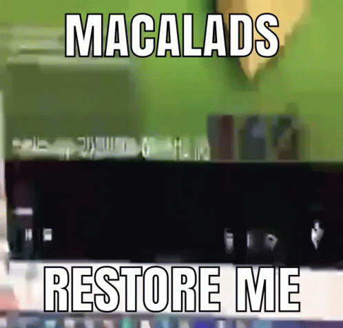 the screen on top of a computer with caption reads macadas restore me