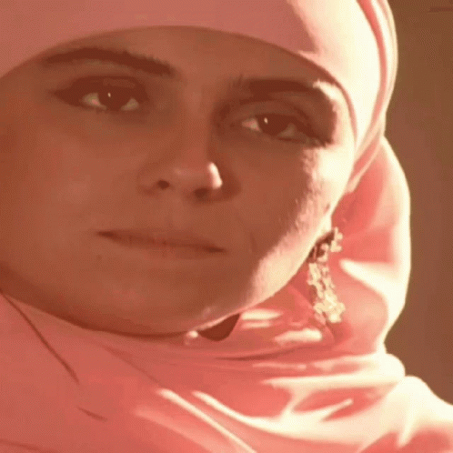 a woman wearing an islamic head scarf