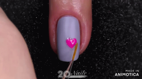 this is a very pretty nail with purple designs on it