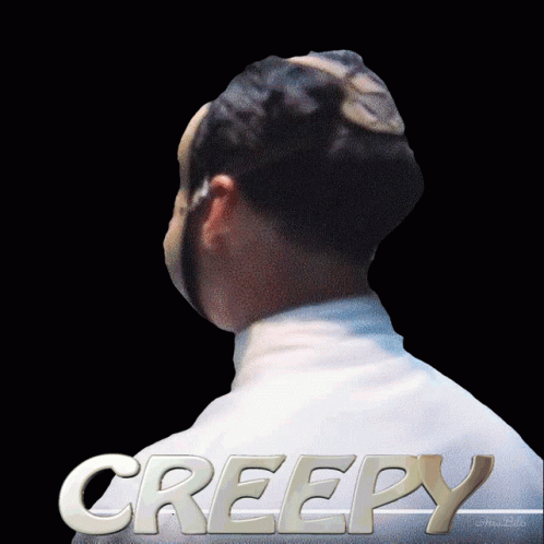 a close up of a person wearing a hat with the word creepy in it