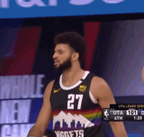 a video player with an afro and beard plays basketball