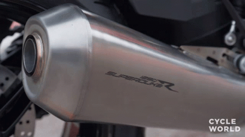 closeup of the exhaust pipe on a bike