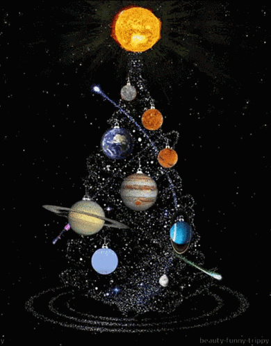 a small christmas tree decorated with planets and stars