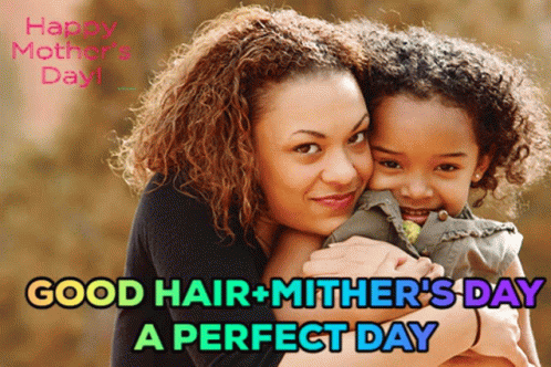 two girls hug in front of a banner saying good hair and mother's day