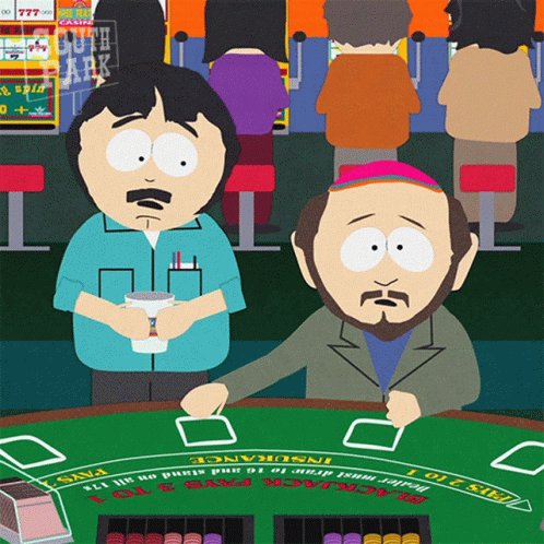 two people stand in front of a blackjack roule table
