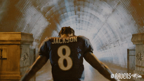 a football player in a tunnel