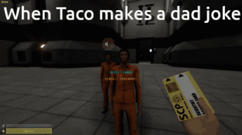 a man holding a sign that says when taco makes a dad joke