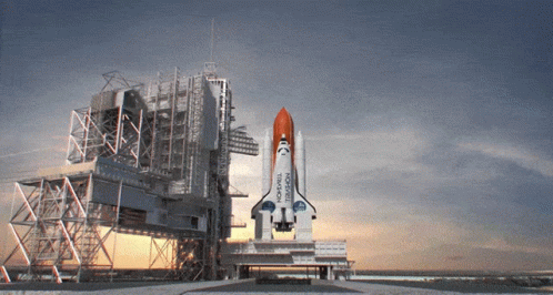 a model of the space shuttle being transported by a rocket