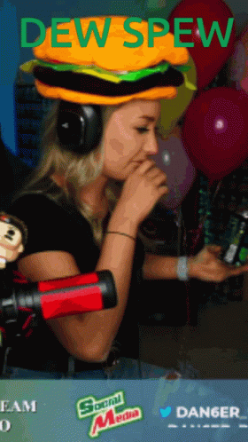 woman dj in blue hat with headphones on with a microphone