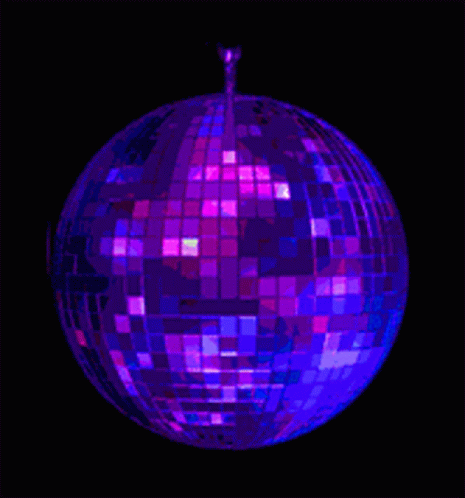 a ball made out of pink squares sitting on a black background