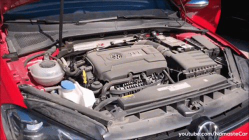 an image of a car's engine bay with the hood open