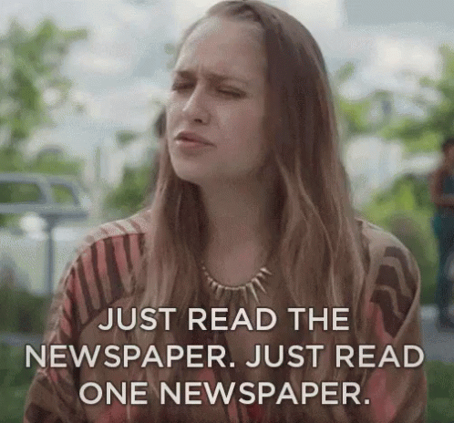 a woman with long hair is holding her head while texting reads just read the newspaper just read one newspaper