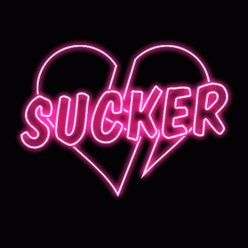 the word sucker is neon with two heart shapes on it