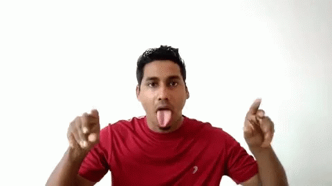 a person posing with their hands in the air