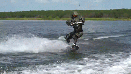 a person on water skis going through the air