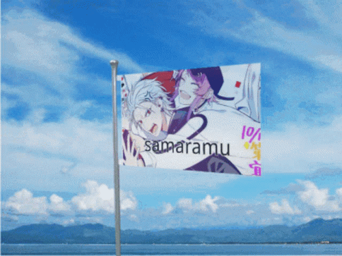 a couple kissing in the wind next to a sign