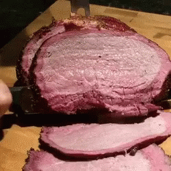 a purple cake has been cut into slices