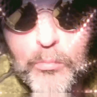 an abstract po of a man wearing sunglasses