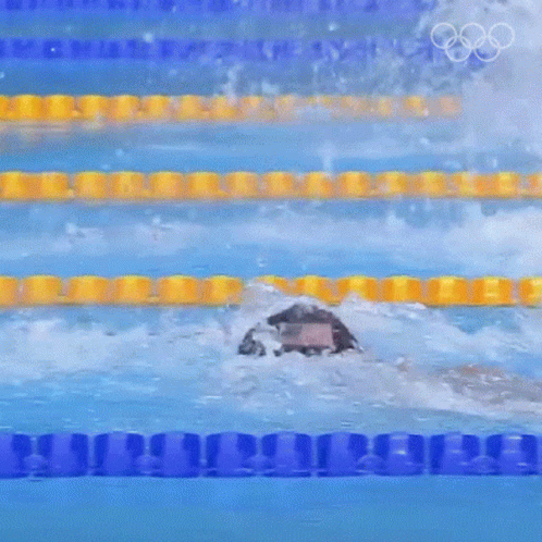 water spouting out from the pool during an olympic event