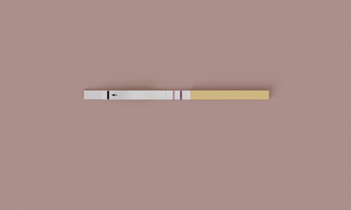 a lighter on a grey surface with the middle section slightly empty