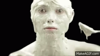 a white male with lots of white substance on his face