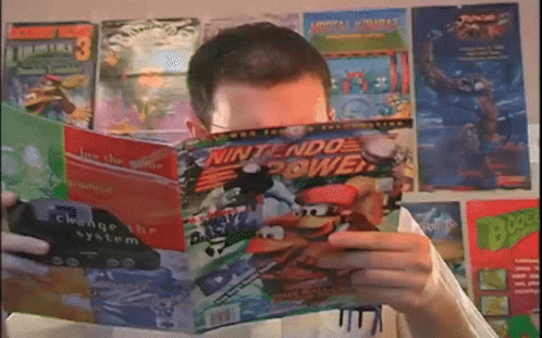 a person standing reading a book with multiple comics around them