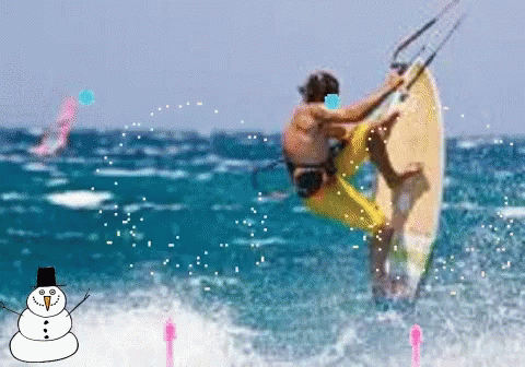 a person holding onto a surfboard while windsurfing