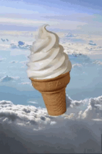 an ice cream cone in the desert has no lid on it