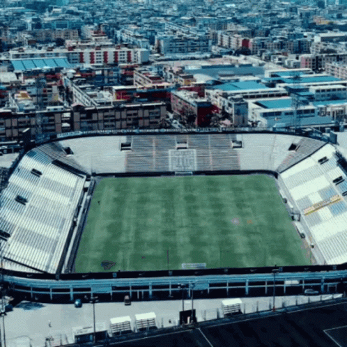 an aerial view of a large stadium field