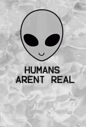 an alien with the words humans aren't real