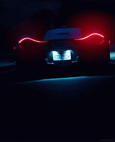 a car at night with blue lights shining
