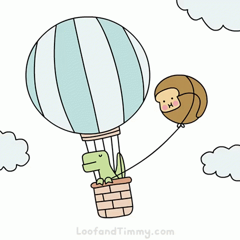 a  air balloon with a small toy monkey