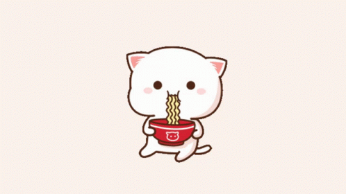 the white kitten has noodles in its mouth
