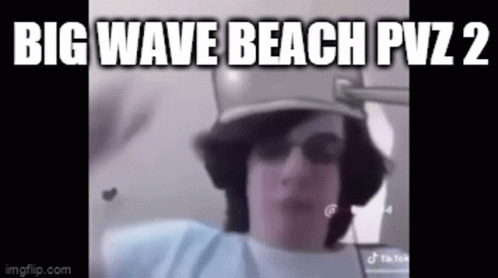 a po of the face of a man with the words'big wave beach pt 2'above it