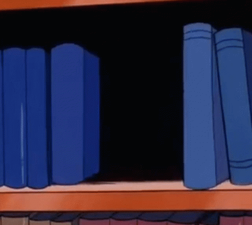 a bunch of books are stacked up on a shelf
