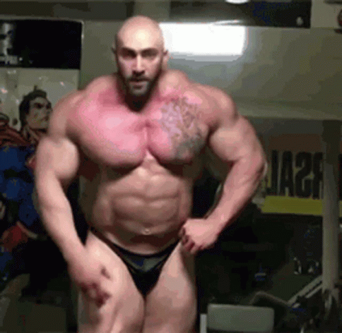 an image of a man showing off his muscles