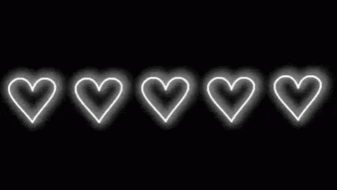 a light painting of five different heart shapes
