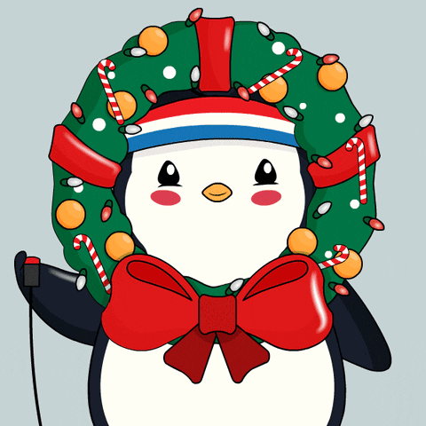 a penguin wearing a wreath that is blue and green