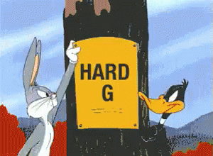 there is an image of peter rabbit and his rabbit friend hing his head on a hard g sign