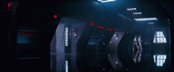 a sci - fi scene of a futuristic building in the dark