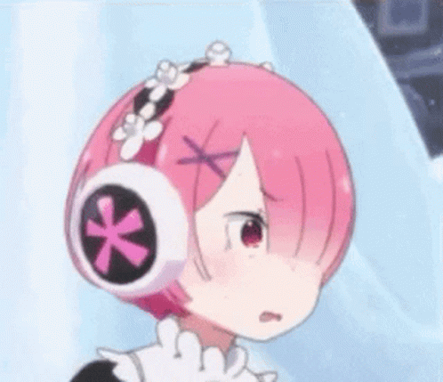 a girl with headphones that look like she has pink hair