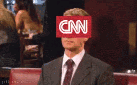 a man is wearing a cnn head device on his face