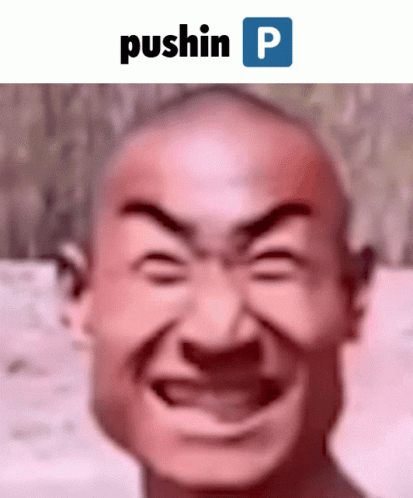 a man smiles while using hin p