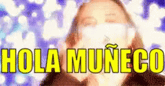 the cover of hola mundo com featuring an image of the face of a woman