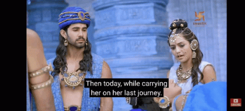 a quote from an indian song with a couple wearing elaborate jewelry