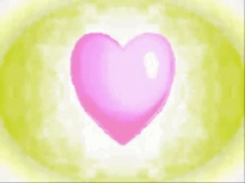 a very big pink heart on a purple blue background