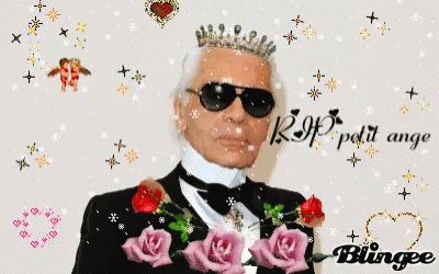 a blue man in a suit and sunglasses with roses on it