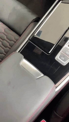 cellphone in the center console of a vehicle