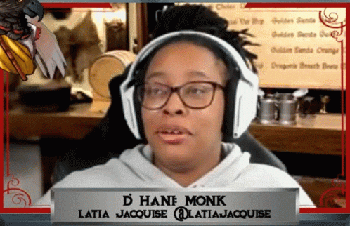 a black woman with glasses and headphones is on a radio show